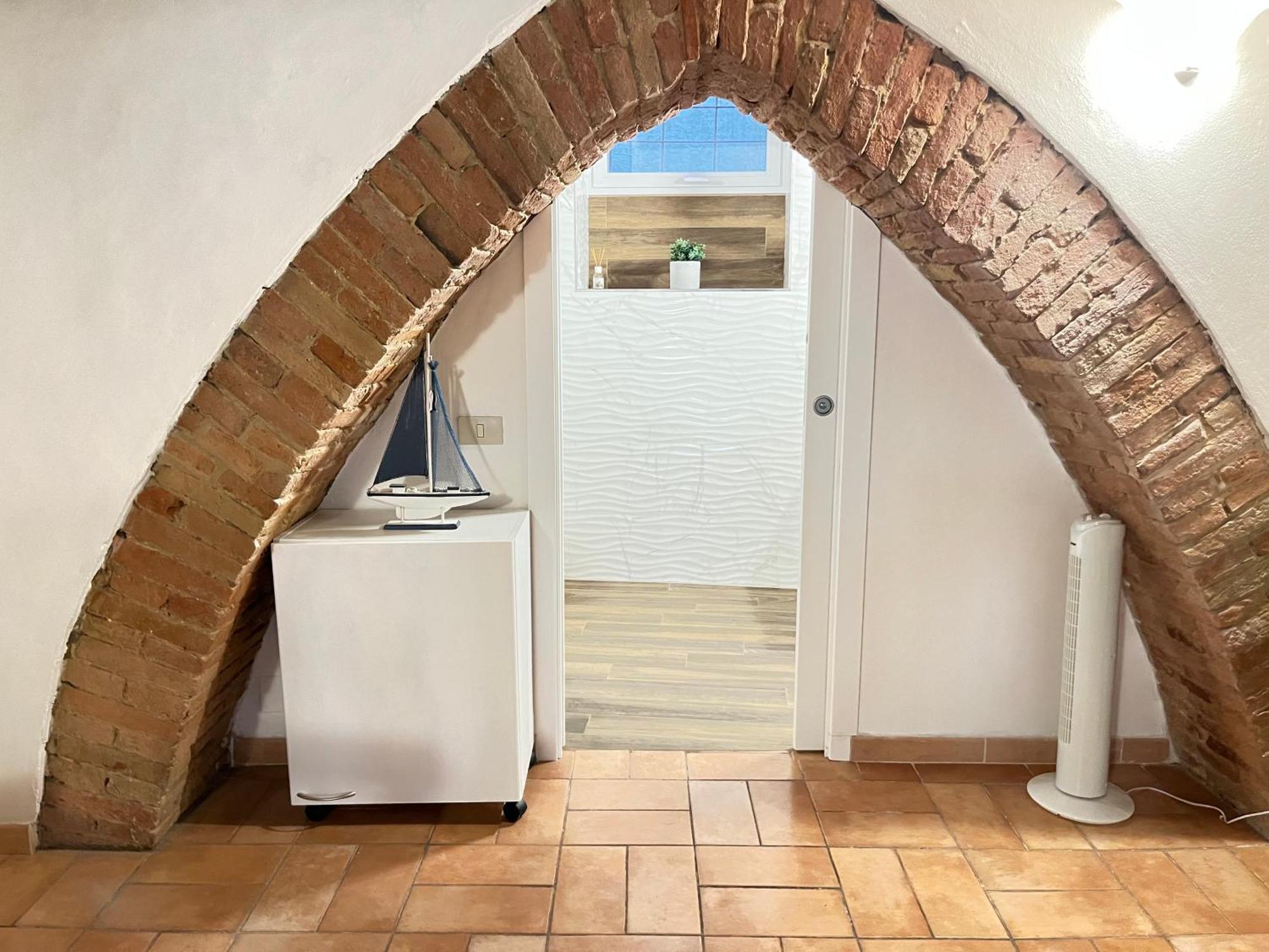 Gli Archi Nel Cuore Di Sienne Extérieur photo